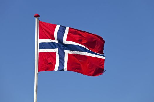 norwegian flag in the wind outdoors