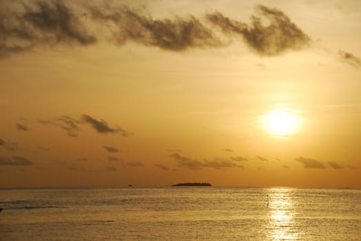 photo of a gorgeous sunset from a Maldivian island