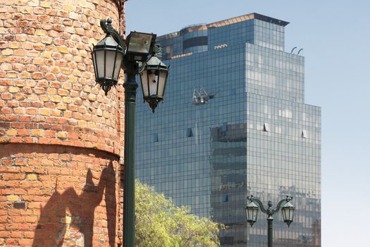 Contrast between vintage  building and modern skyscraper in Santiago, capital of Chile