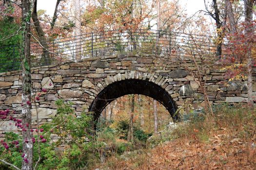 A half moon shaped stone bridge