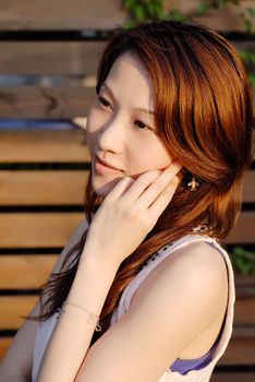 Here is a beautiful Asian lady with the sunset light.