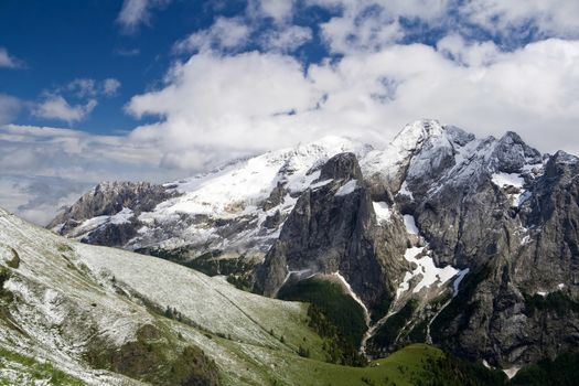 summer snow in Marmolada, famous dolomites mountain, Trentino, Italy. Photo taken with polarizer filter