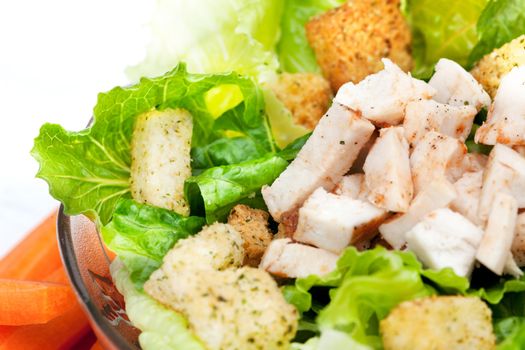 A chicken caesar salad detail
