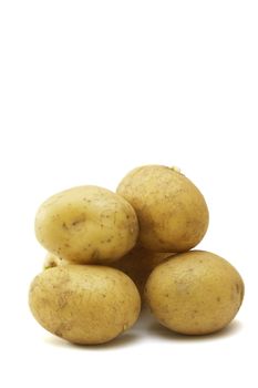 five stacked potatoes on a white background