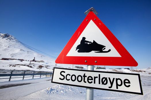 A sign for a snowmobile trail in Longyearbyen, Spitsbergen, Svalbard, Norway
