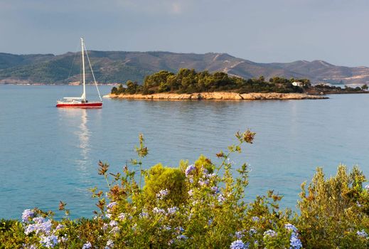 Sailing yacht in a tranquil and serene location among the Greek islands. 