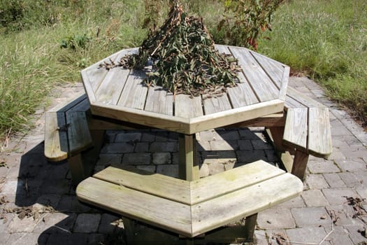 a picnic bench in knockanore county waterford in the south of ireland in summer on the blackwater river edge