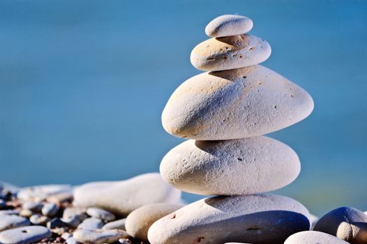 Stacked white gravel on the sea shore