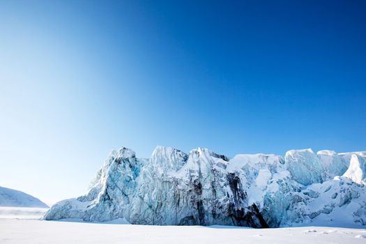 A glacier on the coast of Spitsbergen, Svalbard, Norway.