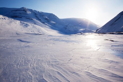 A beautiful winter moutain snow landscape taken on Spitsbergen Island, Svalbard, Norway