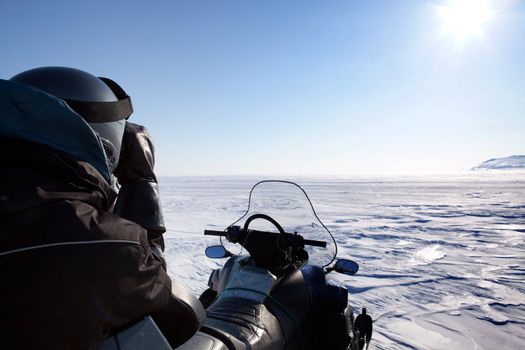 An expedition guide secures the area for polar bears.