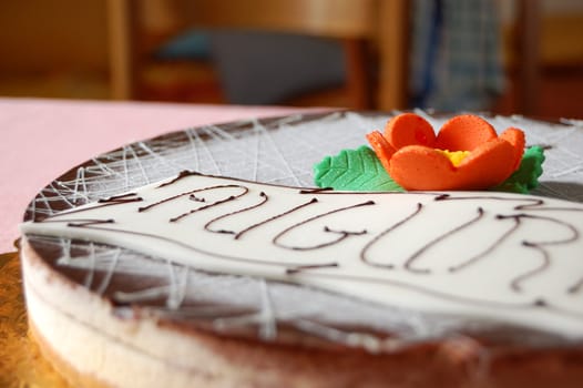 closeup of Birthday pie (chocolate and flower garnished)