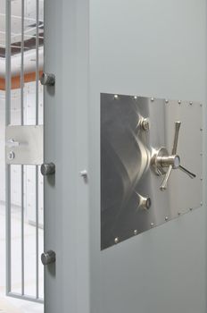 Open massive vault door in an deposit room