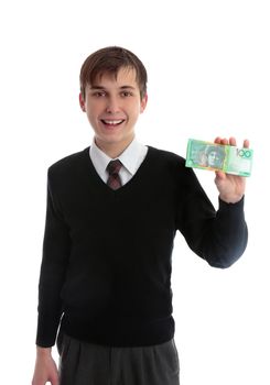 Student schoolboy holding some bills in his hand and smiling.  Concept, school fees, fundraising, charity, first job, student loan.  Only showing 1/2 of the note, front side, back is different. White background.