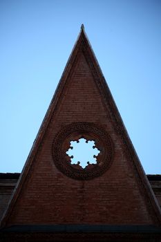 Rose window on blue sky