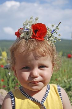 girl with wreath on  landscape background
