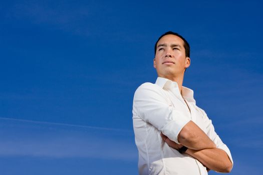 Smart handsome asian man looking forward in a positive and brave manner