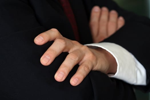 Businessman folding hands