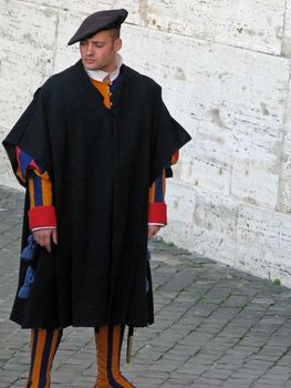 A Swiss Guard member guarding the Vatican in Rome, Italy.