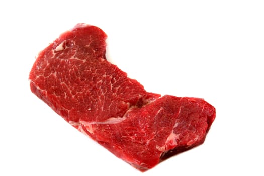 Raw steak isolated on a white background.
