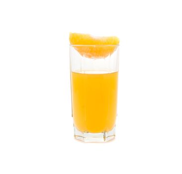 glass with orange juice and orange segment on it, isolated on white