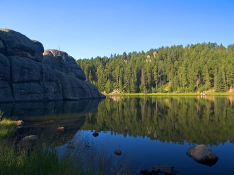 Fishing in the morning at Sylvan Lake in the Black Hills of South Dakota,