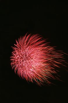 bright colorful fireworks isolated against a black sky
