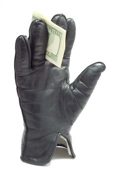 glove with dollars, isolated on white