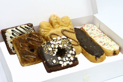 boxed donuts in fancy shapes and flavors
