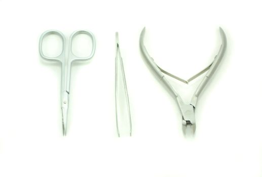 nail scissors set with three items isolated on white