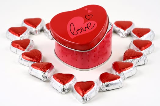 Heart-shaped box with heart-shaped chocolates