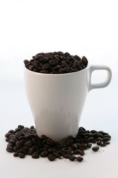 Coffee beans in a mug