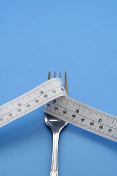 Fork and measuring tape