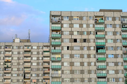 Front view of gray blocks with flat houses
