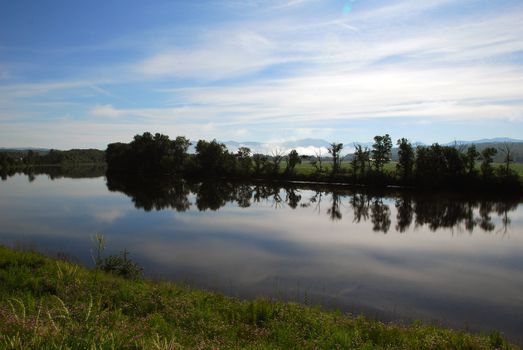 Picture of a calm river on a Summer morning