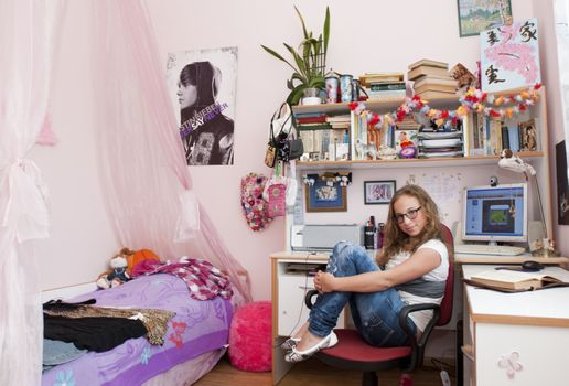 Teenager girl relax home - sitting on chair