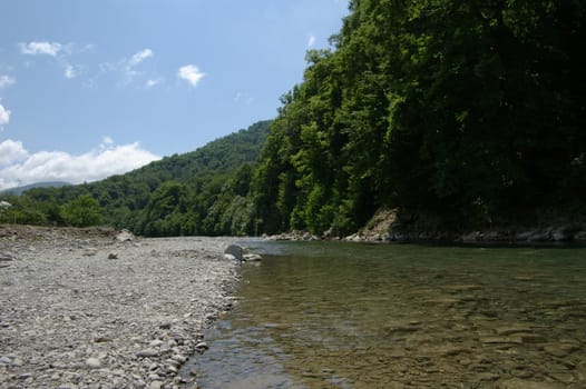 mountain river Sochi falling into Black sea