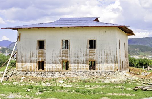 A tibetan style building being constructed in Shangrila, China