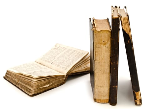 old books against white background 