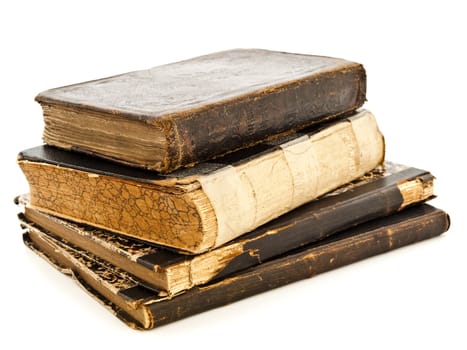 stack of old books against white background 