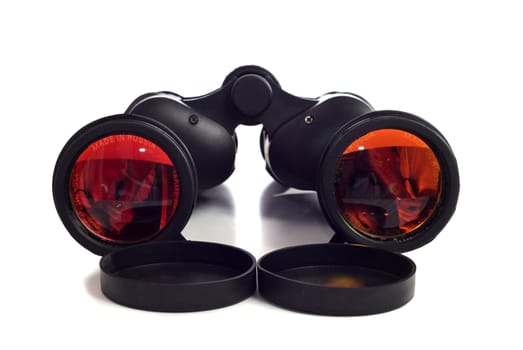 A set of black binoculars shot on a white background
