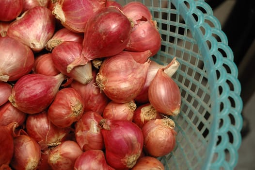 closeup shot of garlic inside basket that used for cooking