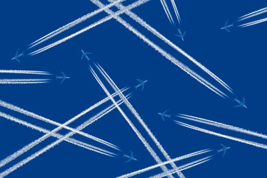 Heavy traffic: airliners criss-crossing the blue sky.