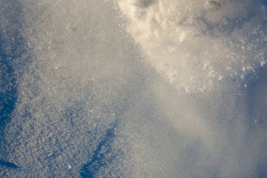 Cloud of powdery snow of approaching avalanche.