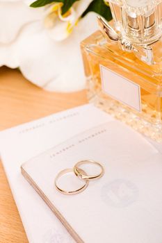 orchid bouquet, perfume passports and wedding rings - bridal accessories
