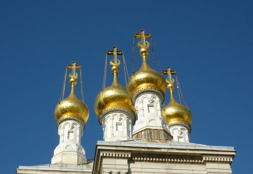 Gold dome of russian church by beautiful weather