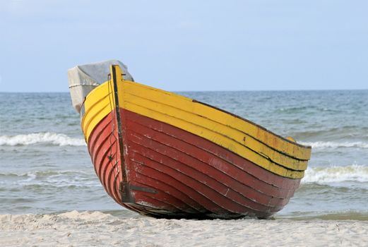 Wooden boat on the seashore
