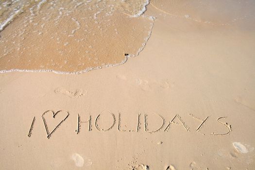 I love holidays - label on the beach
