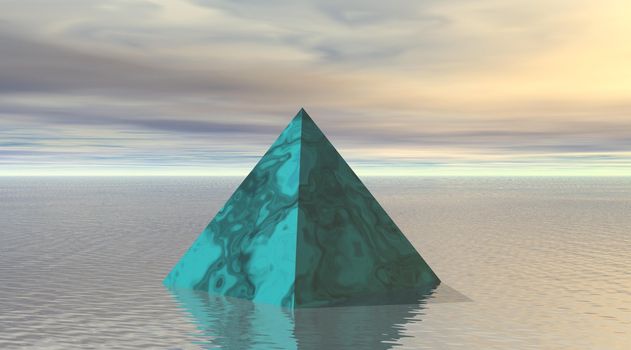 Green pyramid on a quiet lake.