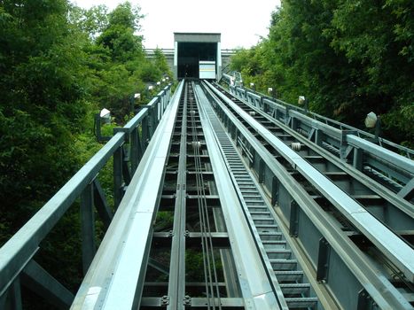 Rails of funicular among vegetation in old Quebec